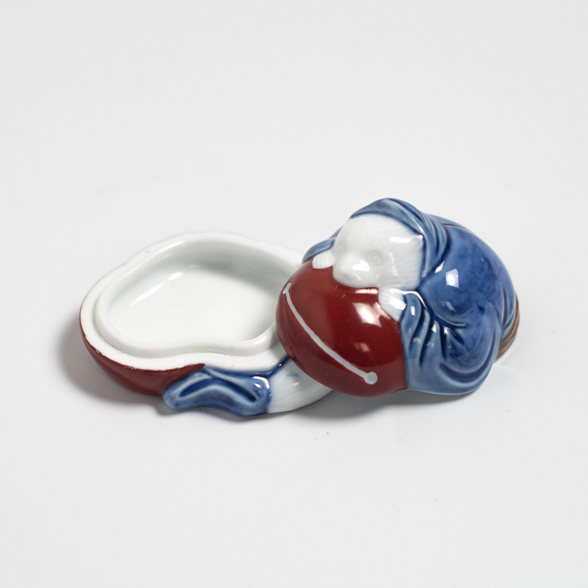 Arita Ware: Tanuki-Shaped Incense Container with Blue-and-White Decoration and Overglaze Enamel
